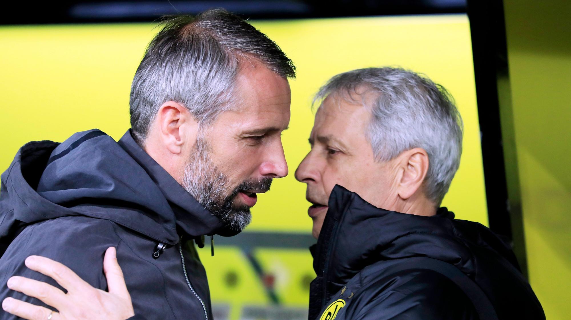 Die Trainer Marco Rose (l.) und Lucien Favre (r.) unterhalten sich im Oktober 2019 beim Duell zwischen Dortmund und Gladbach.