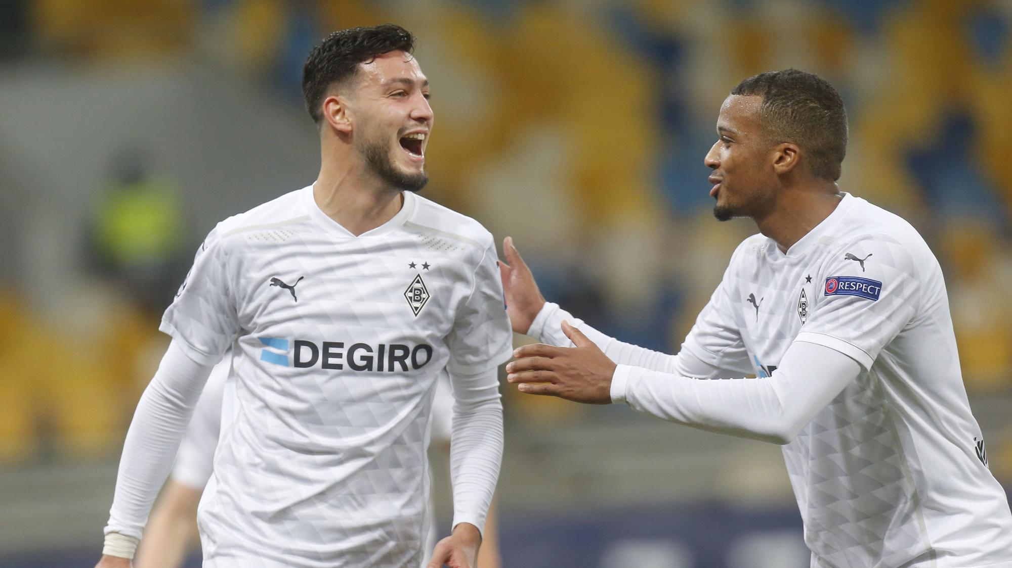 Ramy Bensebaini (l.) und Alassane Plea (r.) trafen bei Auswärtssieg gegen Schachtar Donezk.