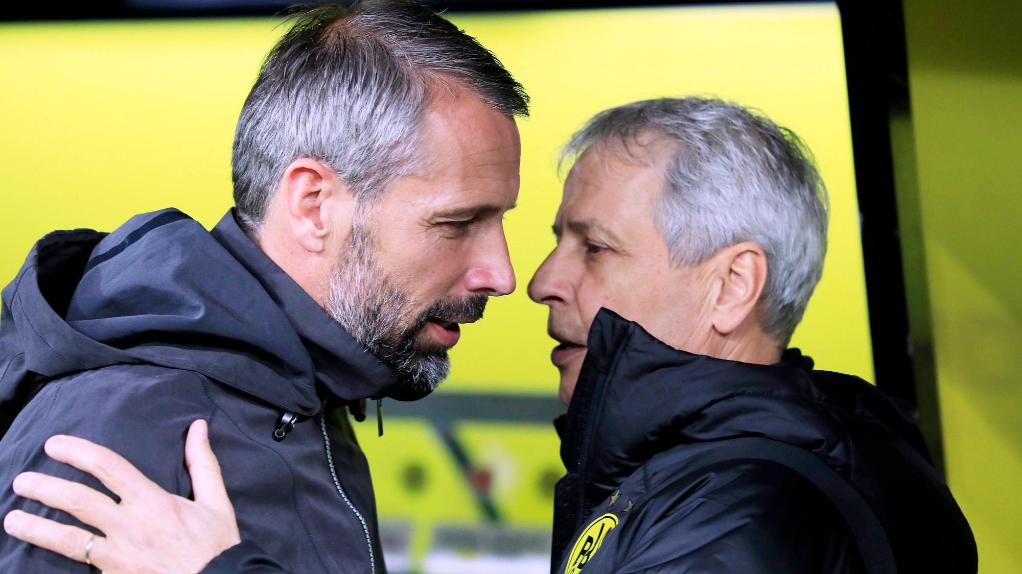Gladbachs Trainer Marco Rose (l.) und seine Kollege Lucien Favre (r.) im Gespräch an der Seitenlinie im Dortmunder Stadion im Oktober 2019.