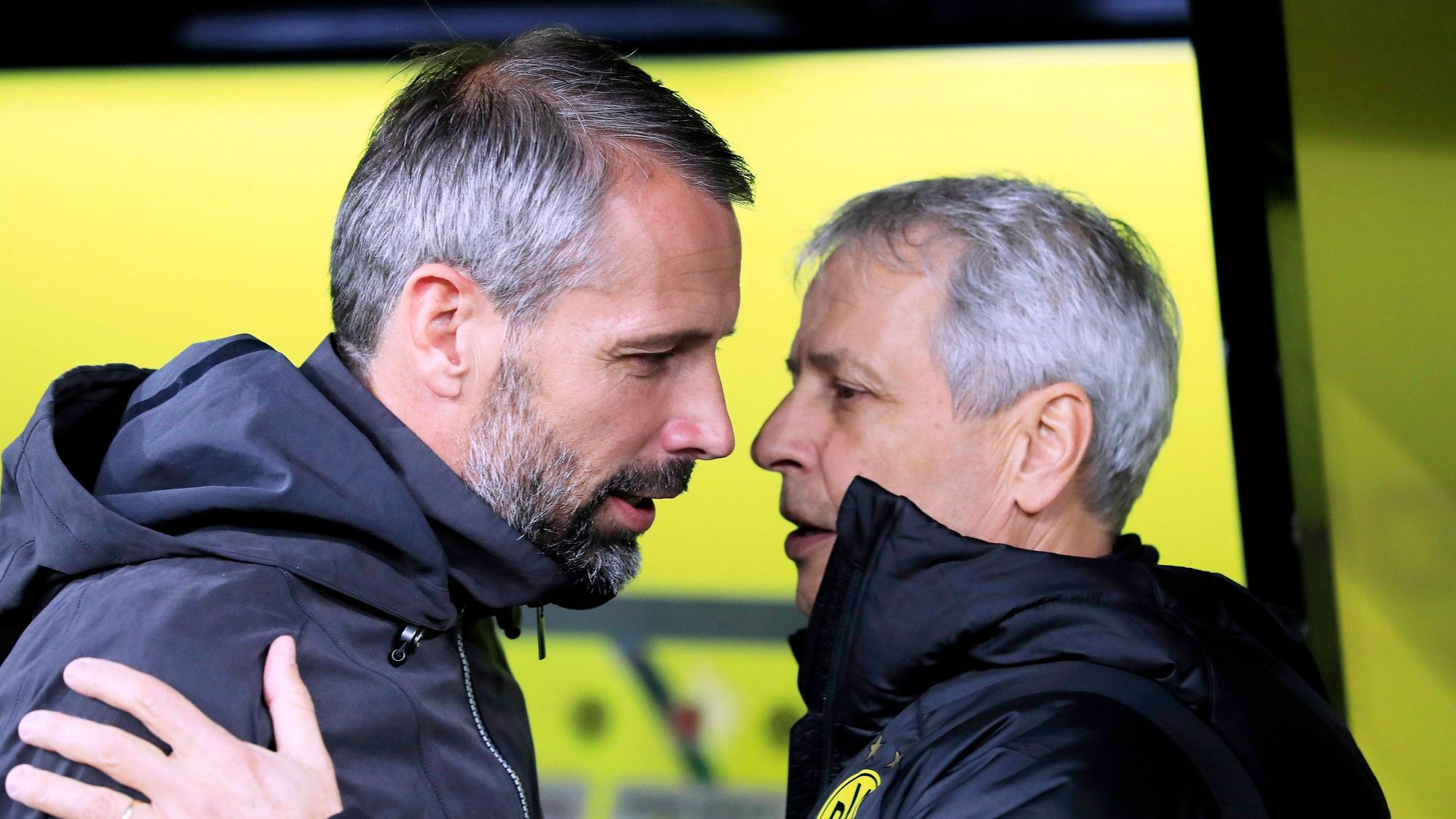 Marco Rose (li.) und Lucien Favre (re.) begrüßen sich am 19. Oktober 2019 vor einem Bundesligaspiel in Dortmund.