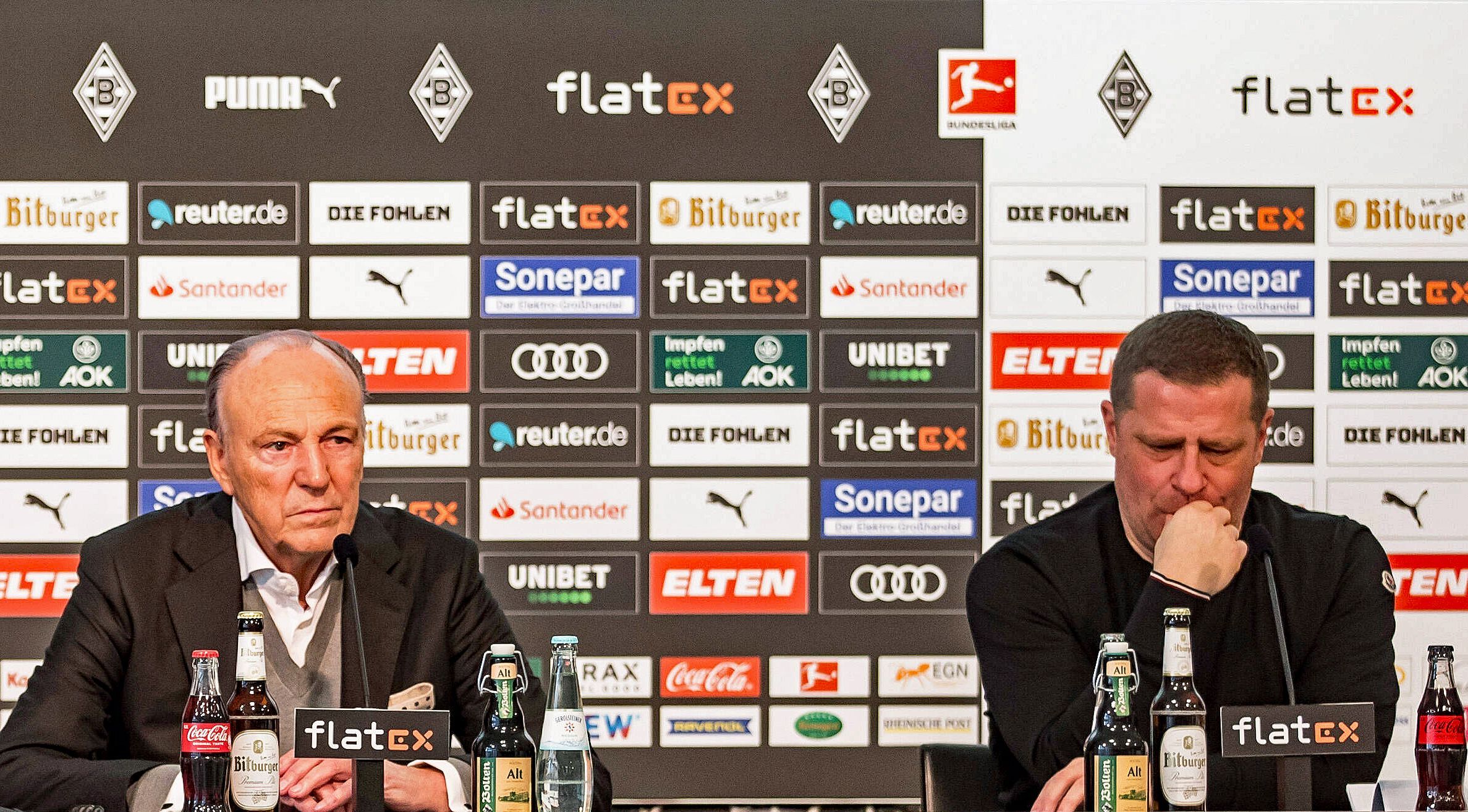 Das Ende der Zusammenarbeit zwischen Rolf Königs (l.), Präsident von Borussia Mönchengladbach, und Max Eberl (r.) als Fohlen-Manager am 28. Januar 2022 im Borussia-Park. Eberl blickt nach unten, Königs nach vorne.