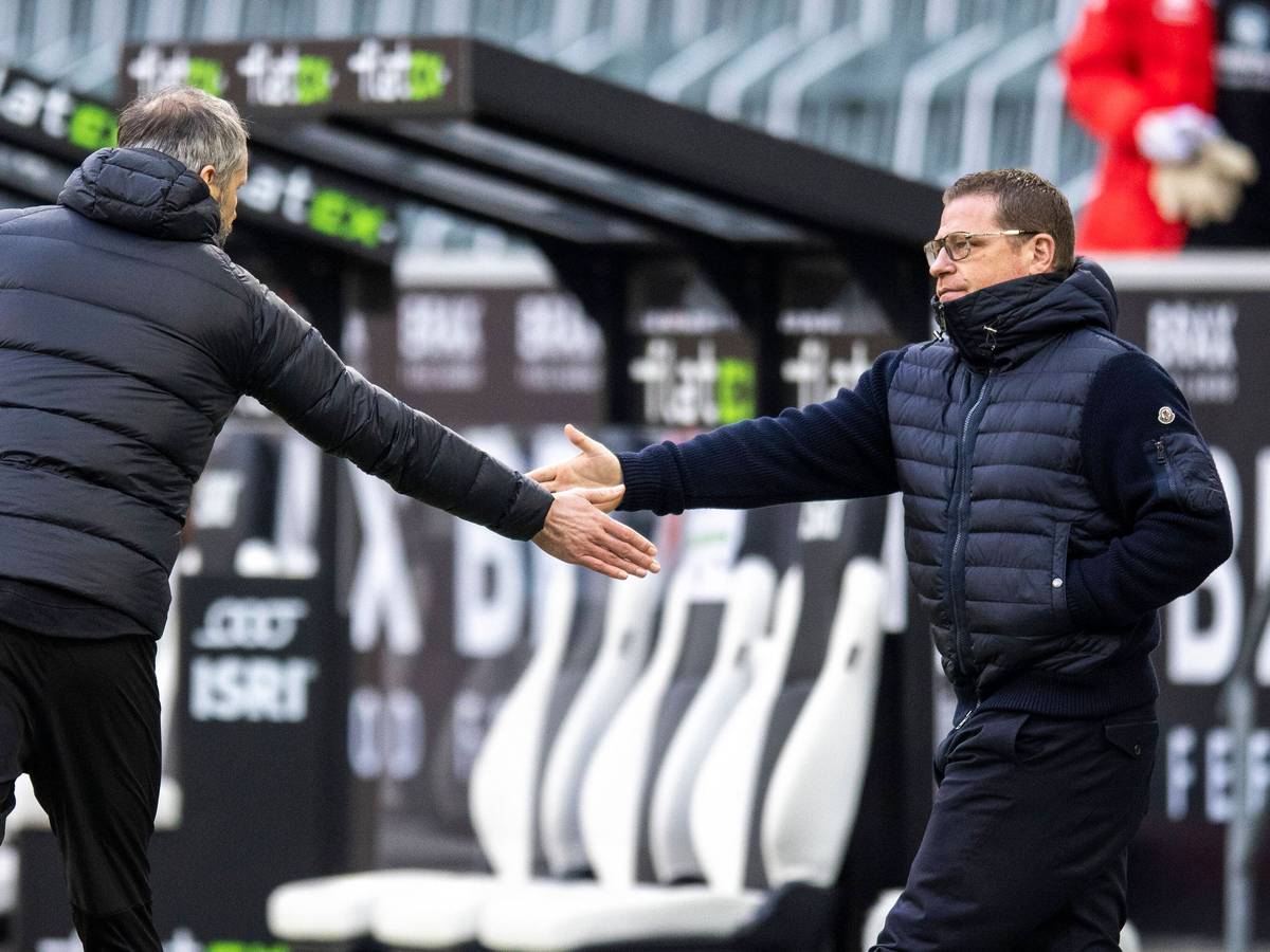 „Best Friends“ bald wieder vereint? Marco Rose (l.) und Max Eberl (r.) verbindet nicht nur die gemeinsame Vergangenheit bei Borussia Mönchengladbach. Eberl und Rose reichen sich in diesem Bild gegenseitig die Hand.