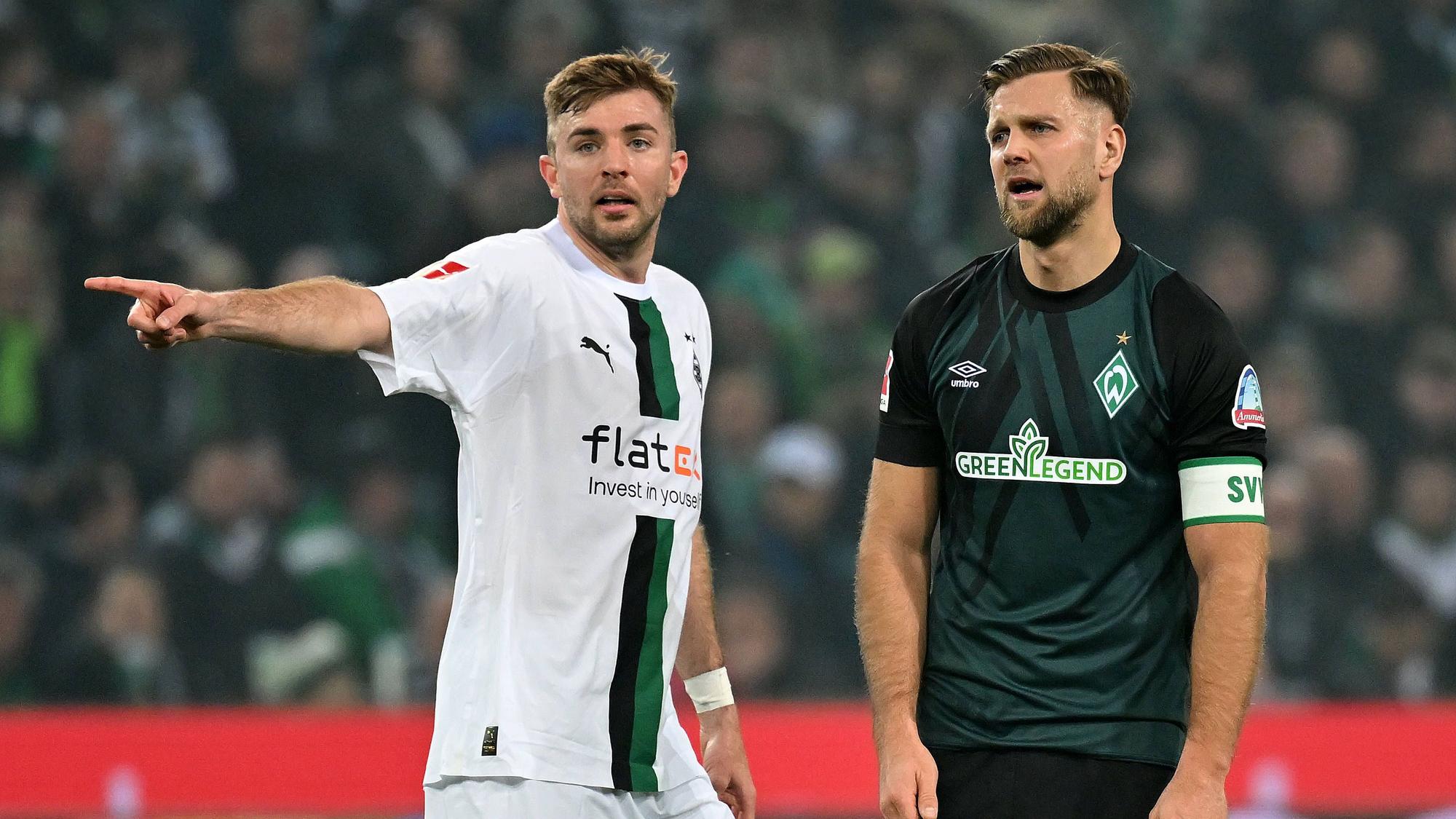 Das Foto zeigt den deutschen Nationalspieler Niclas Füllkrug (r.) gemeinsam mit Christoph Kramer beim Spiel von Borussia Mönchengladbach gegen Werder Bremen am 17. März 2023.