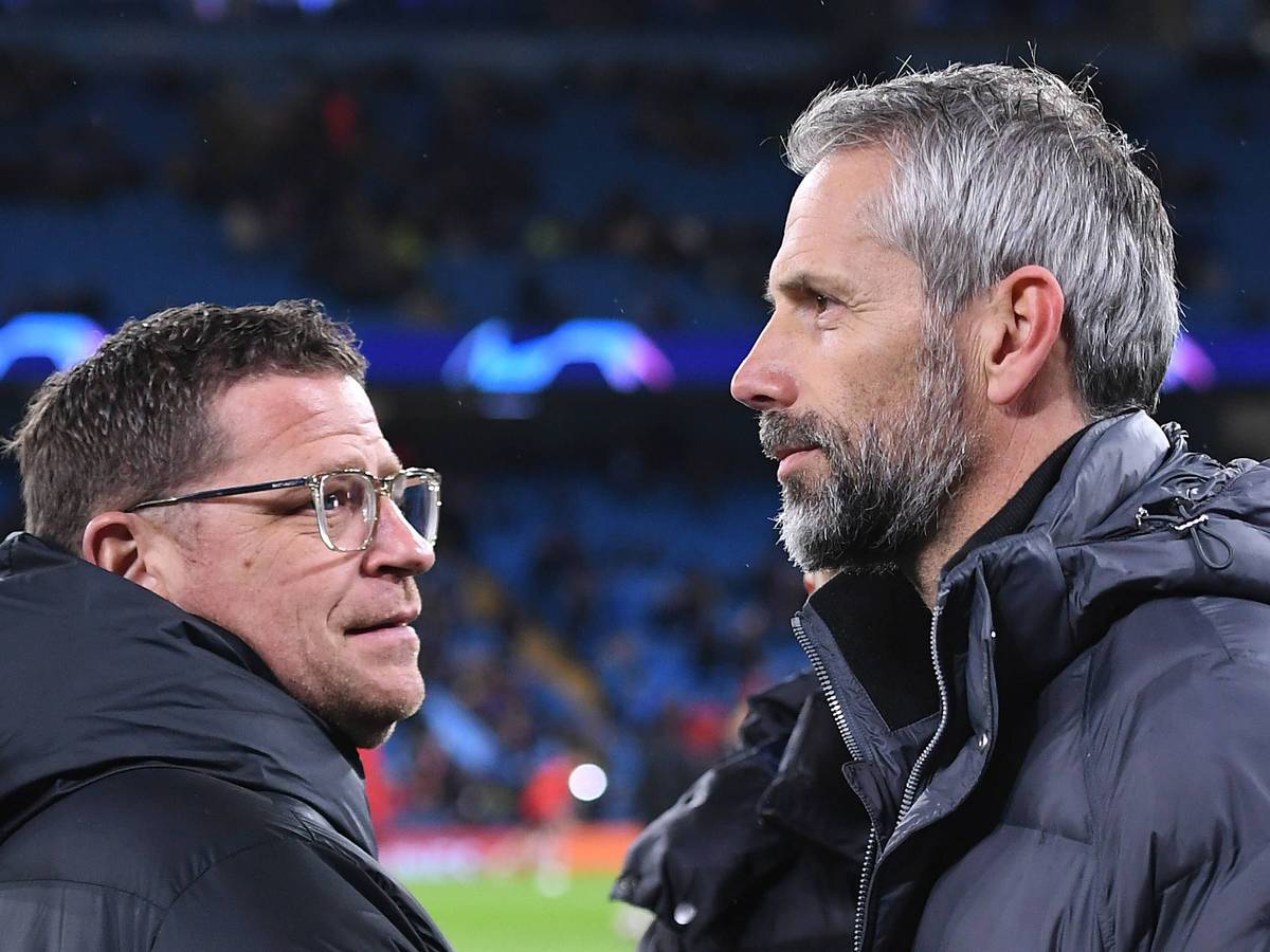 Ex-Gladbach-Manager Max Eberl (l.) und Ex-Borussia-Coach Marco Rose (r.). Beide sind nun bei RB Leipzig unter Vertrag. Das Foto zeigt Eberl und Rose am Rande des Champion-League-Duells bei Manchester City (14. März 2023). Eberl schaut zu Rose.