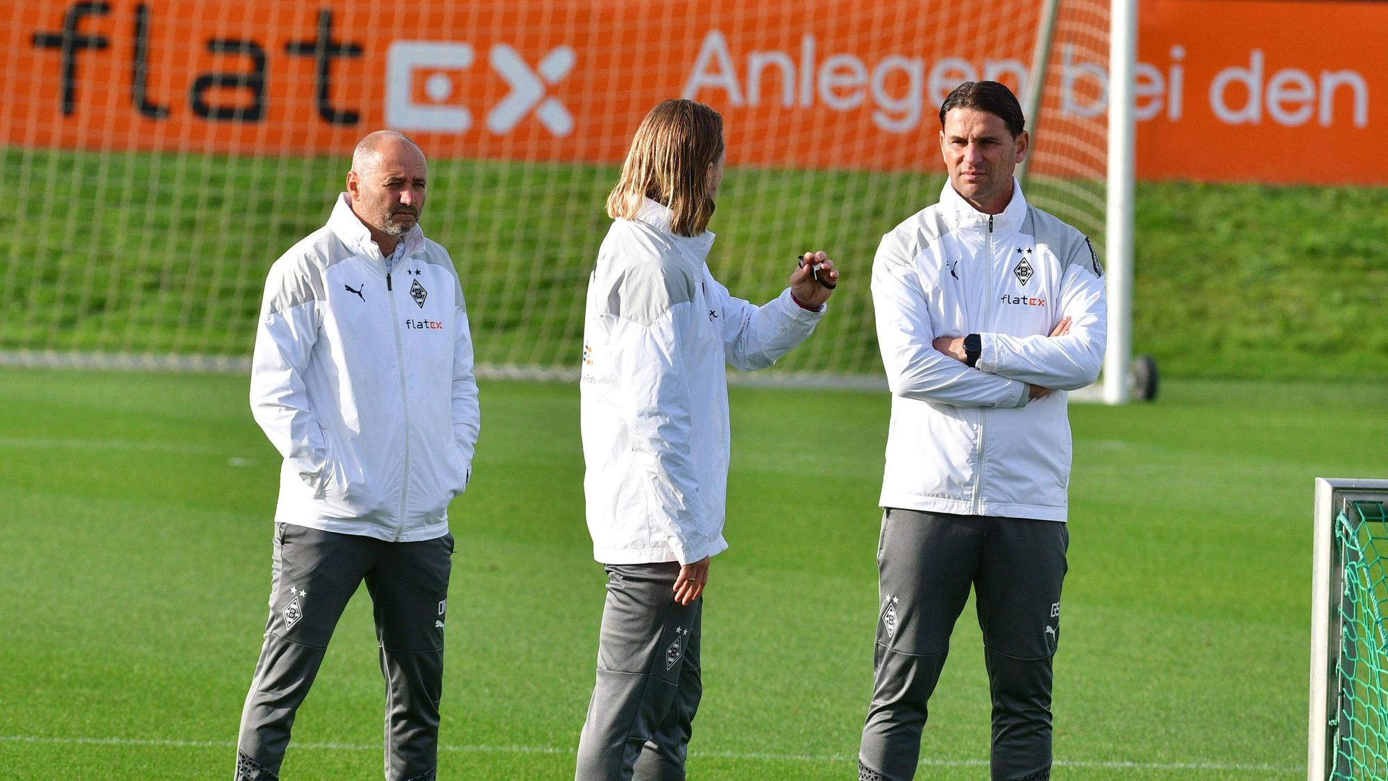 Oliver Neuville, Eugen Polanski und Gerardo Seoane auf dem Trainingsplatz.