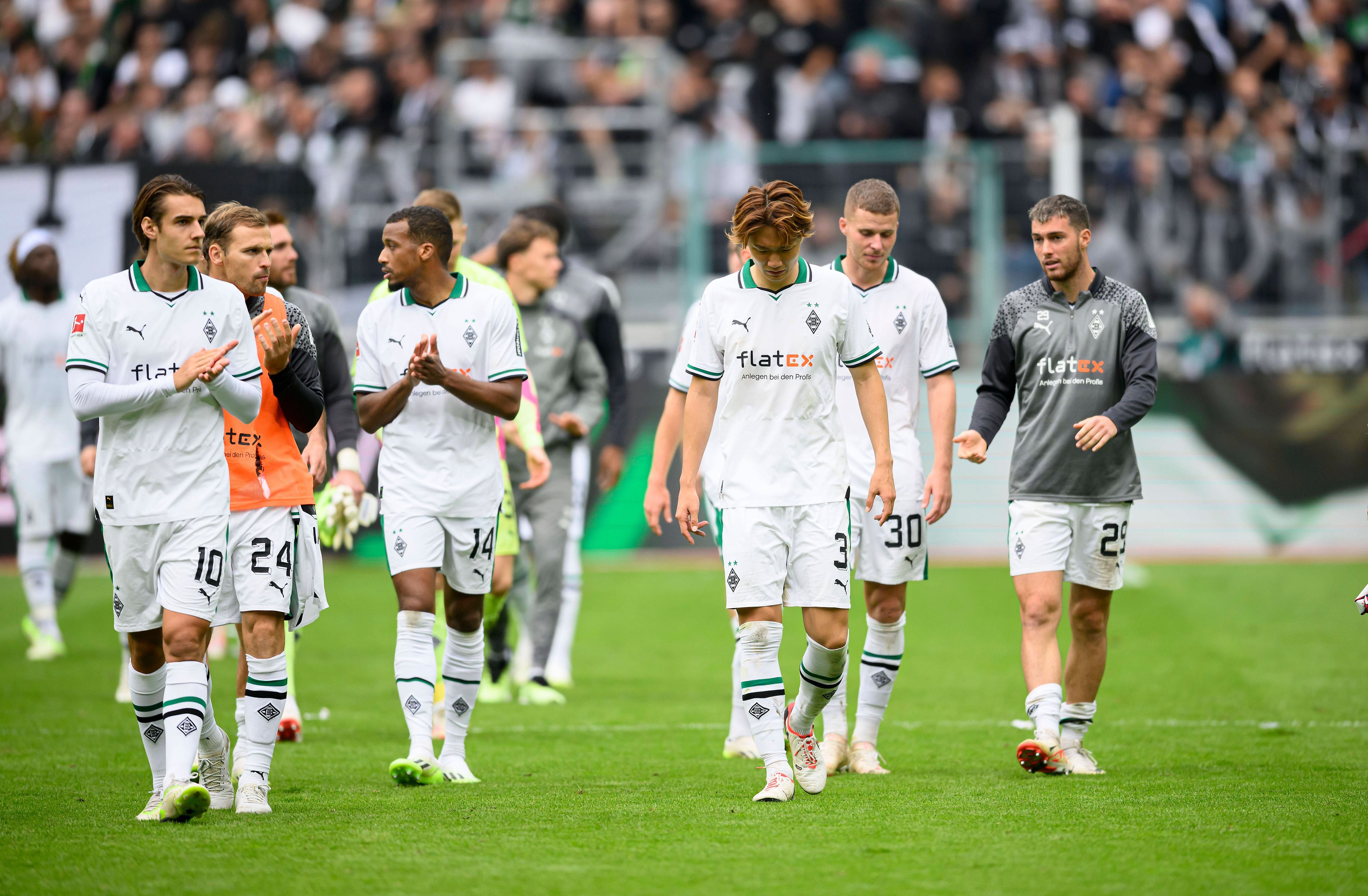Die Borussia-Spieler bei einer Extrarunde im Stadion.