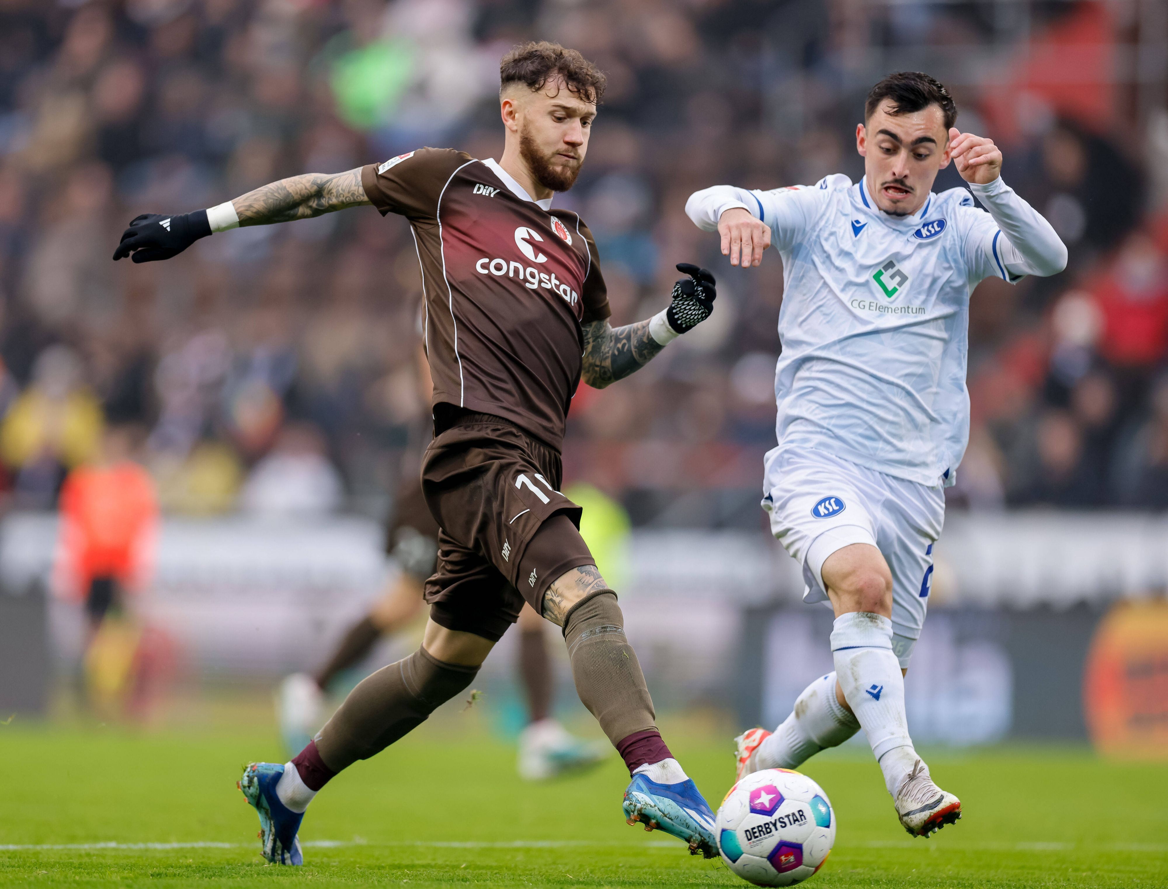 Marcel Hartel im Duell mit Paul Nebel.