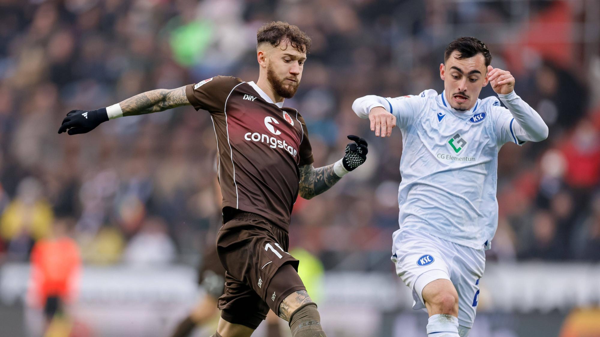 Marcel Hartel im Duell mit Paul Nebel.
