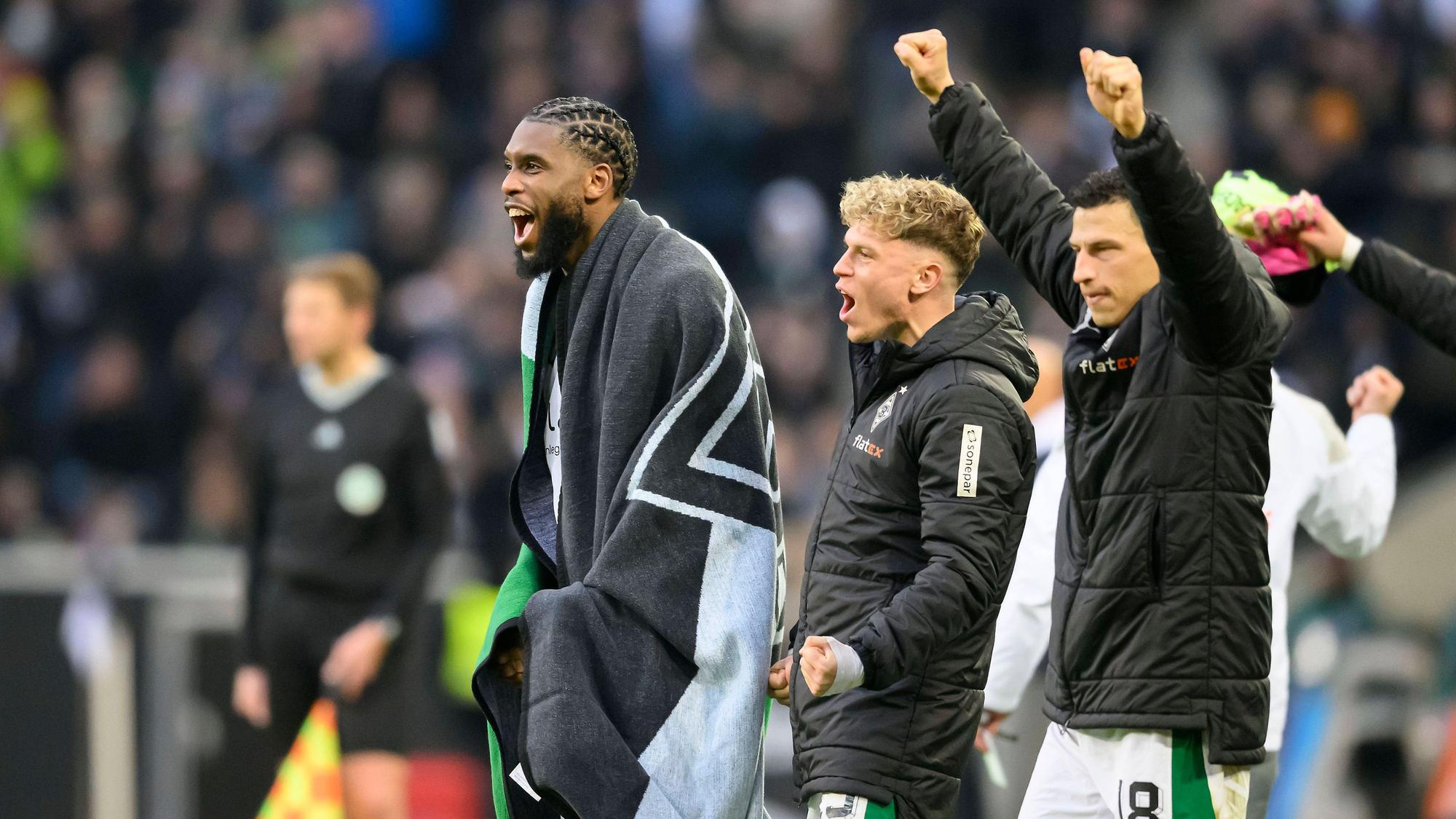 Spieler von Borussia Mönchengladbach jubeln.