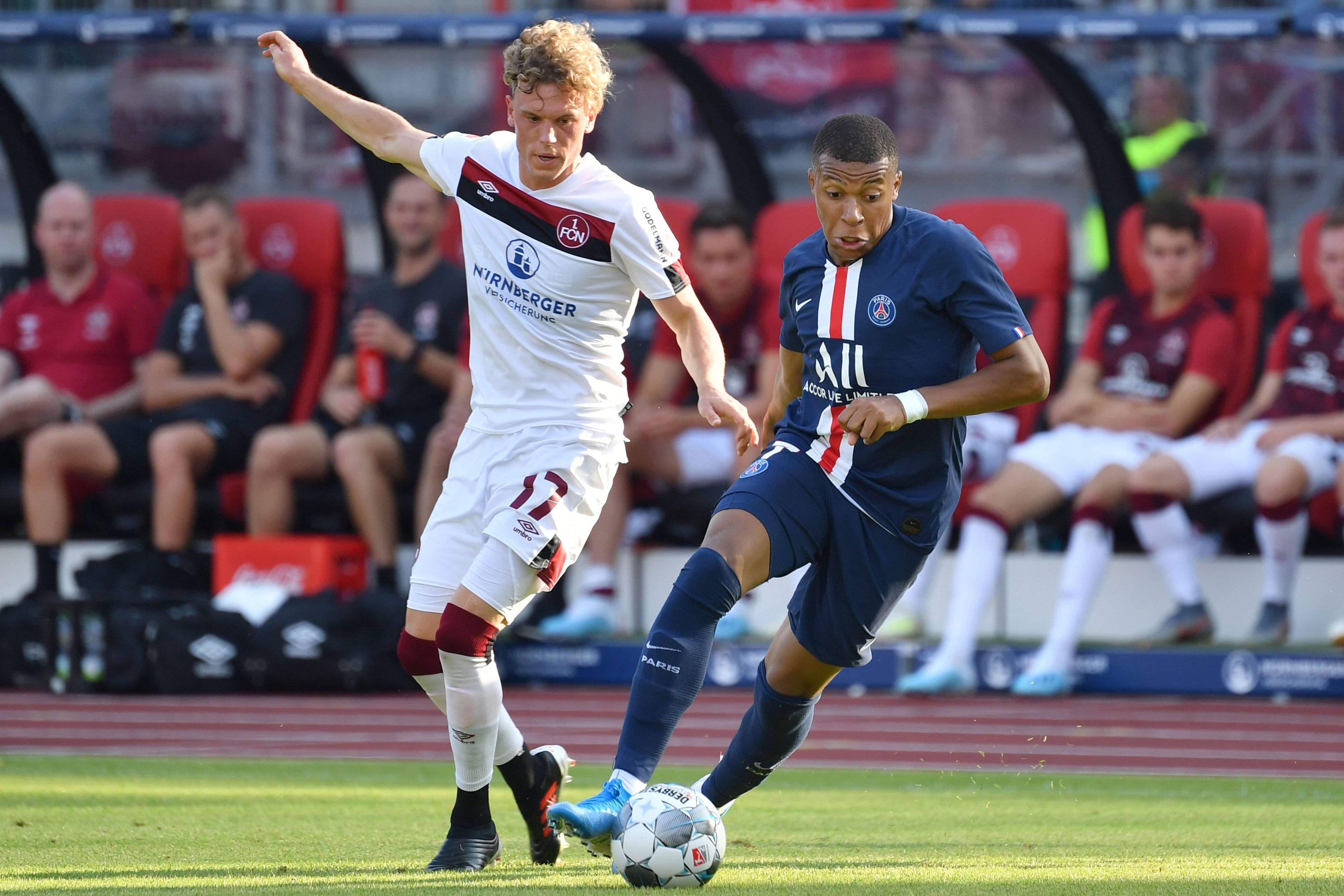 Robin Hack und Kylian Mbappé