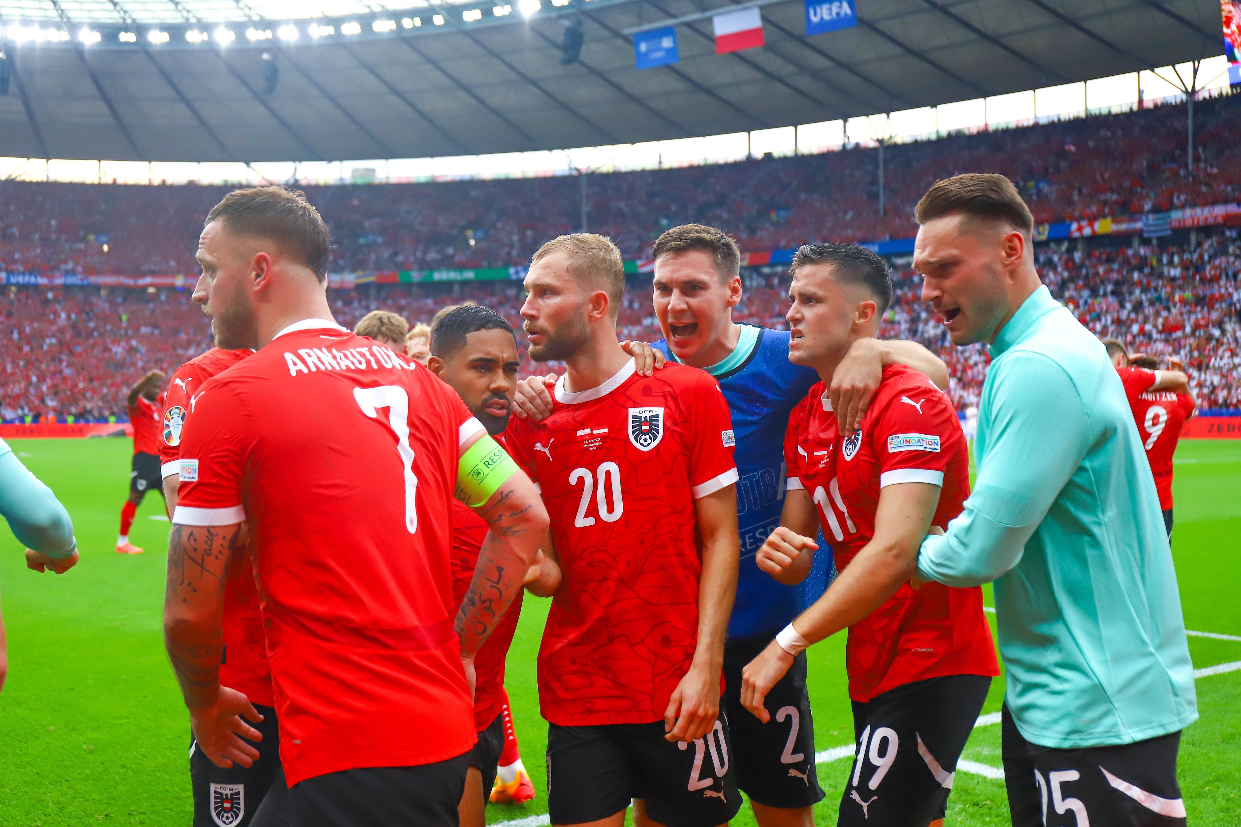 Nationalspieler von Österreich jubeln.