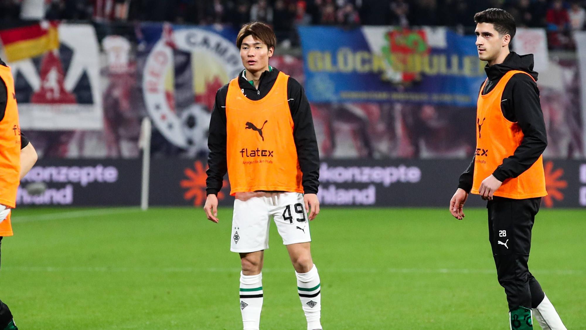 Shio Fukuda und Grant-Leon Ranos wärmen sich auf.