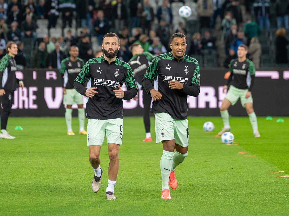 Franck Honorat und Alassane Plea beim Aufwärmen.