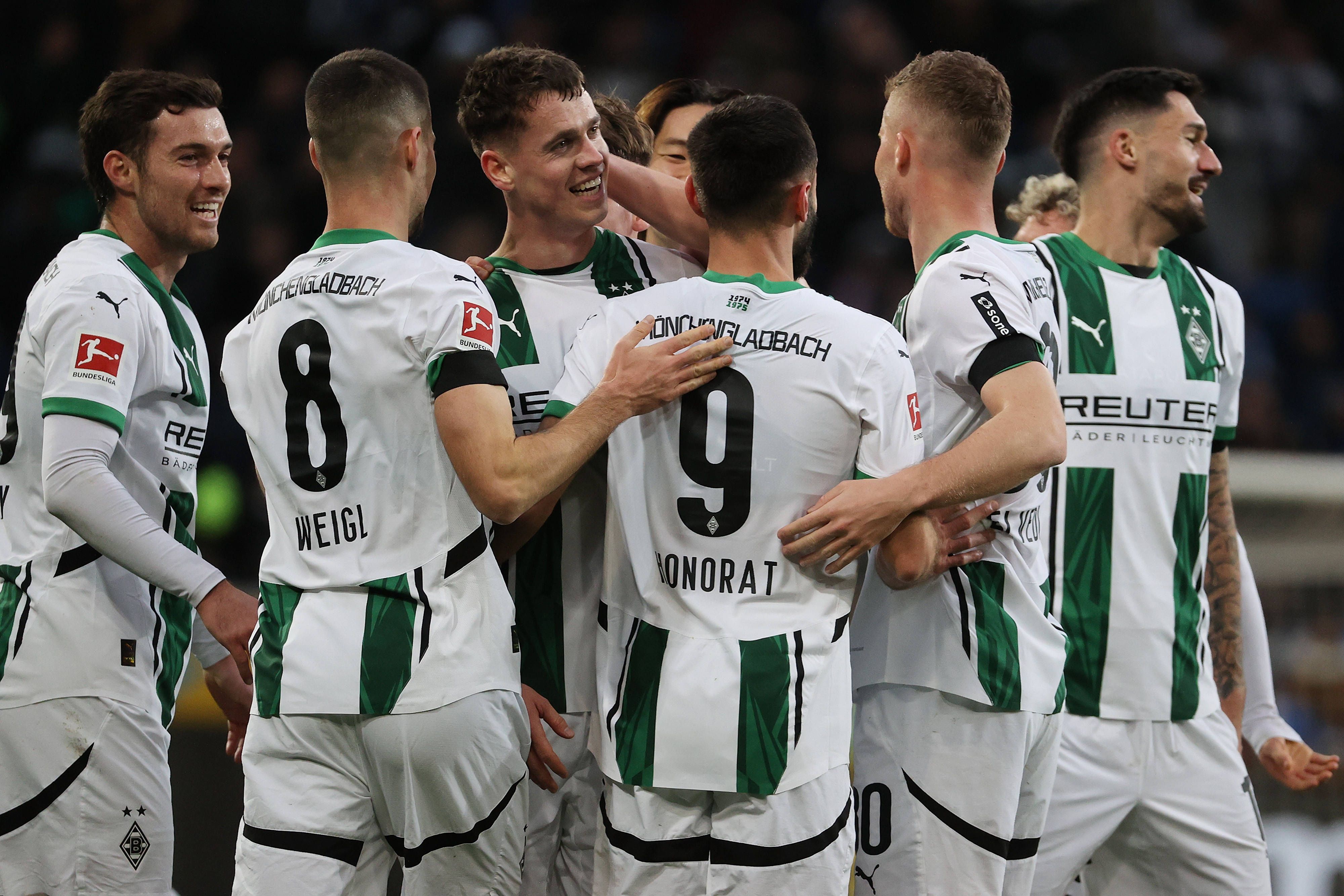 Profis von Borussia Mönchengladbach jubeln.
