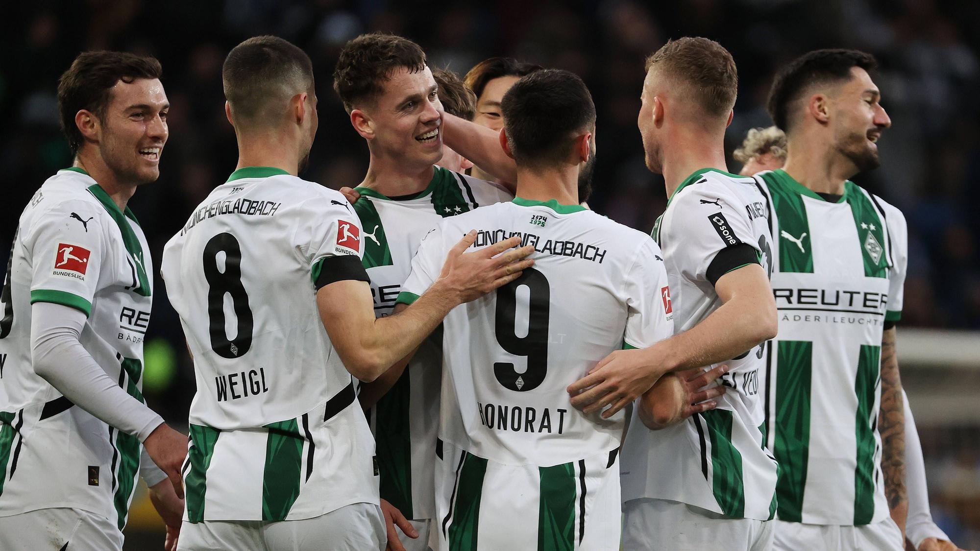 Profis von Borussia Mönchengladbach jubeln.