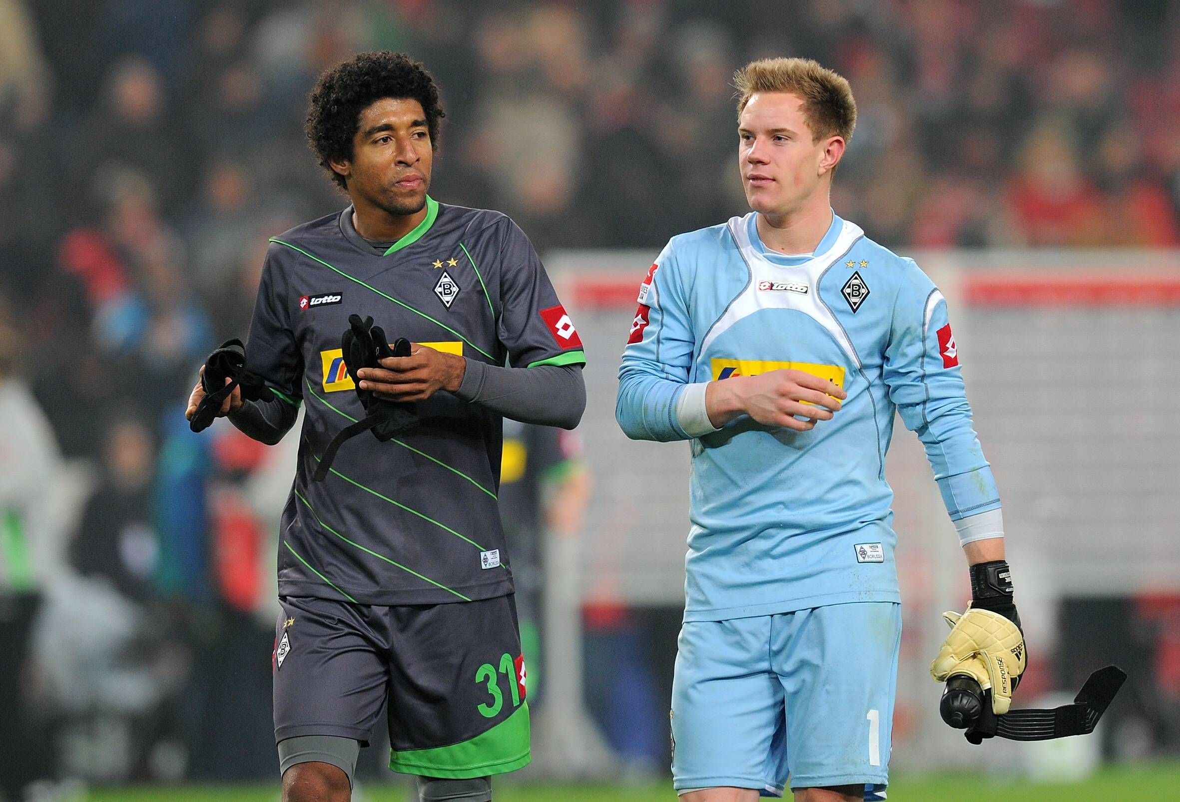 Dante und Marc-André ter Stegen im Gladbach-Trikot auf dem Platz.