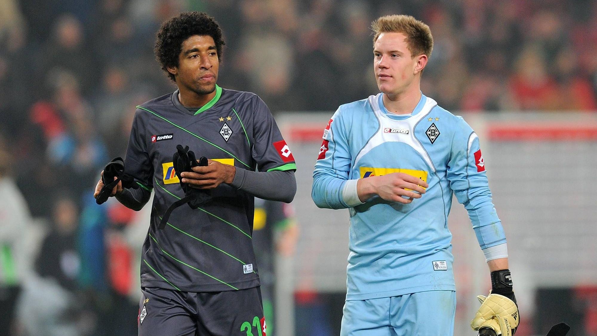 Dante und Marc-André ter Stegen im Gladbach-Trikot auf dem Platz.