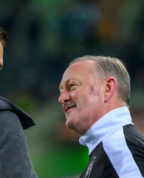 Roland Virkus und Sebastian Kehl im Austausch.