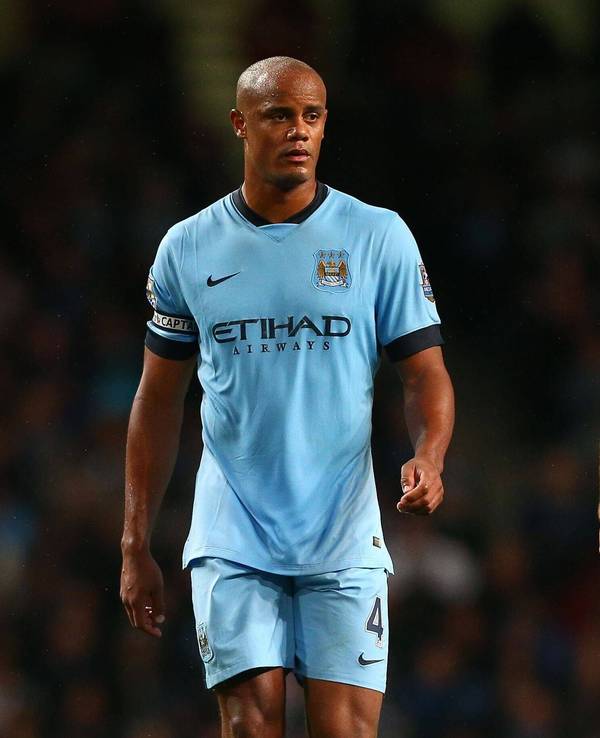 Vincent Kompany und Martin Demichelis im Trikot von Manchester City.