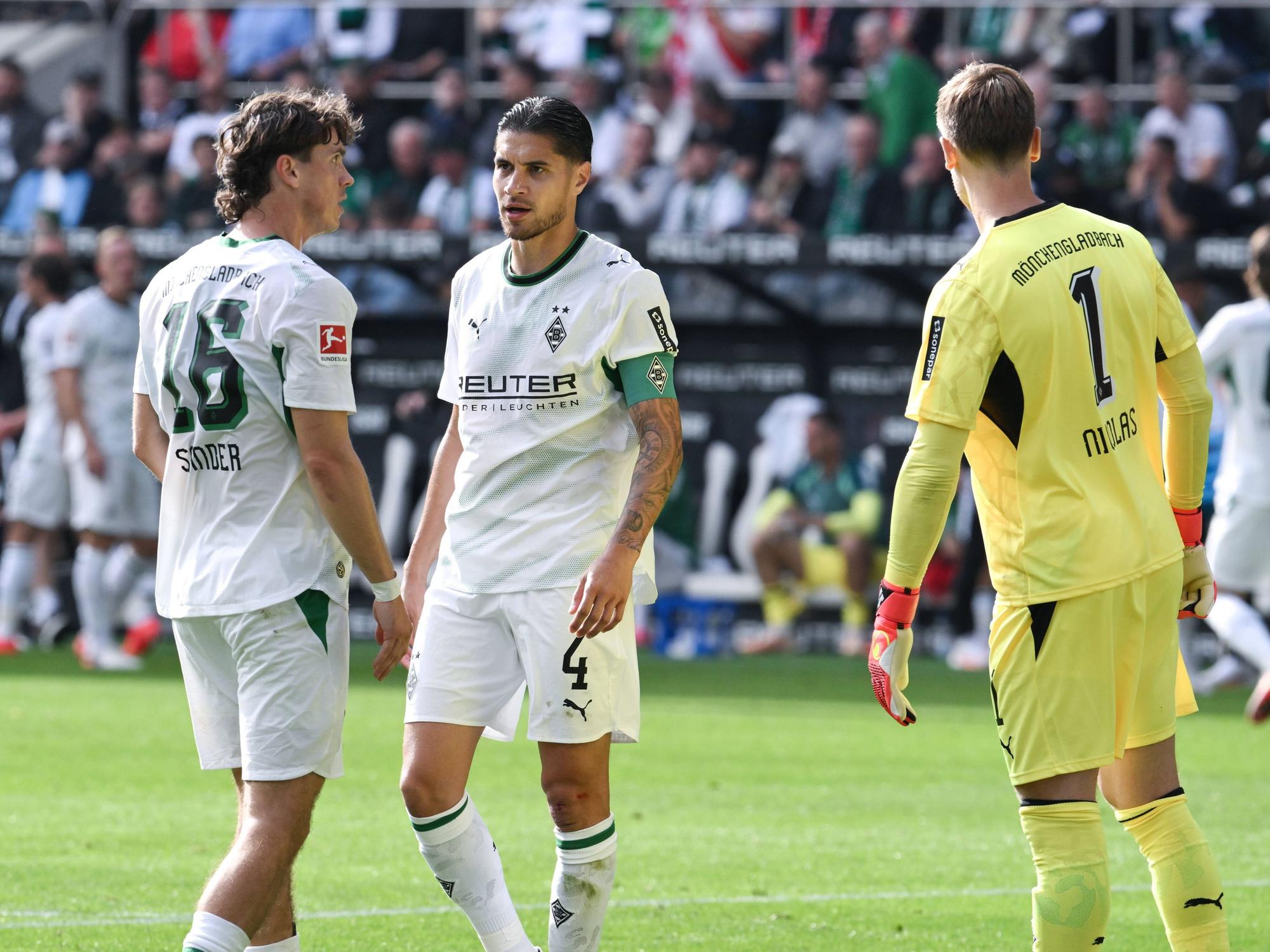 Philipp Sander, Kevin Diks und Moritz Nicolas auf dem Platz.