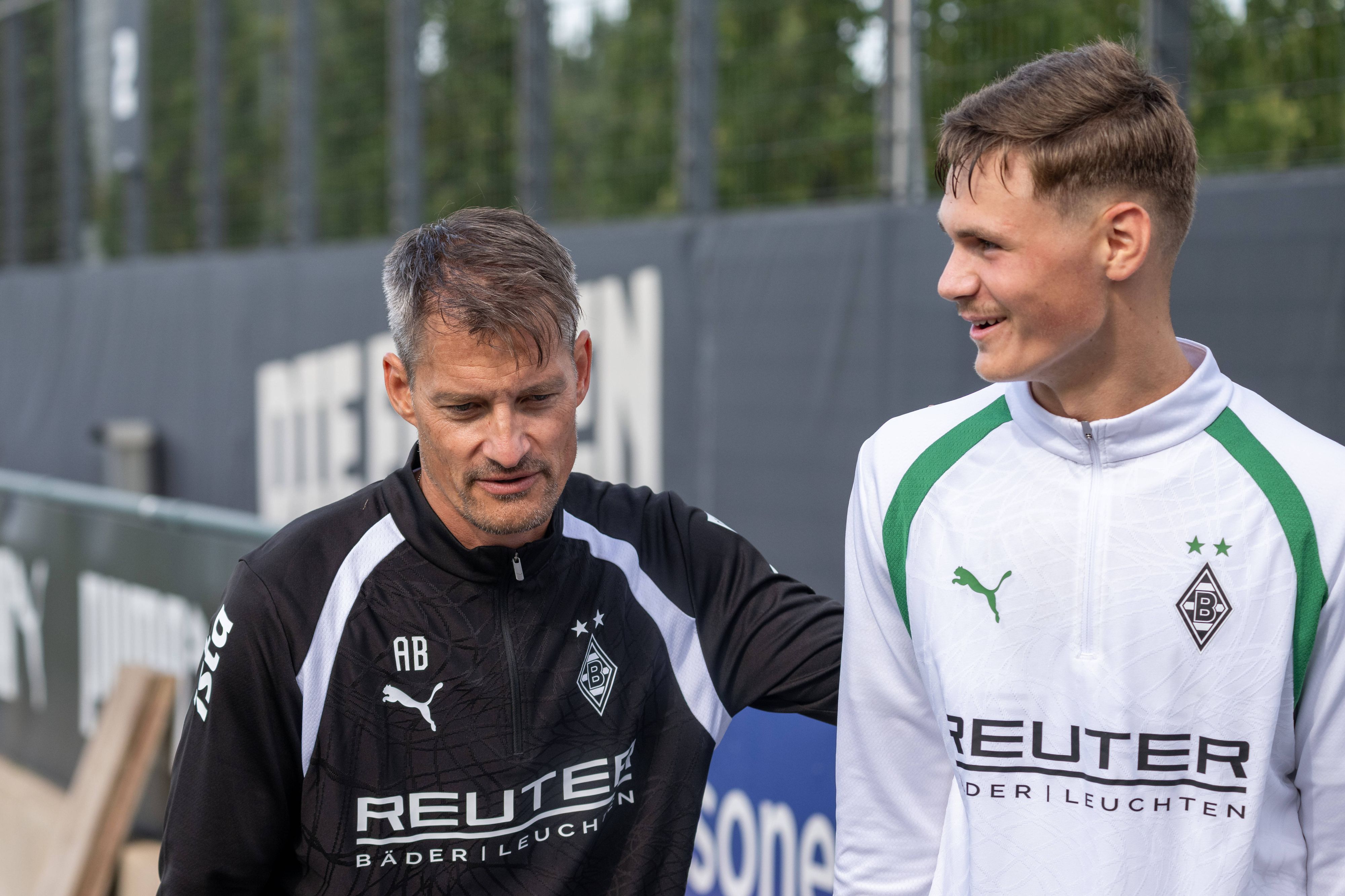 Alexander Blessin und Samin Mujevic in Sportkleidung