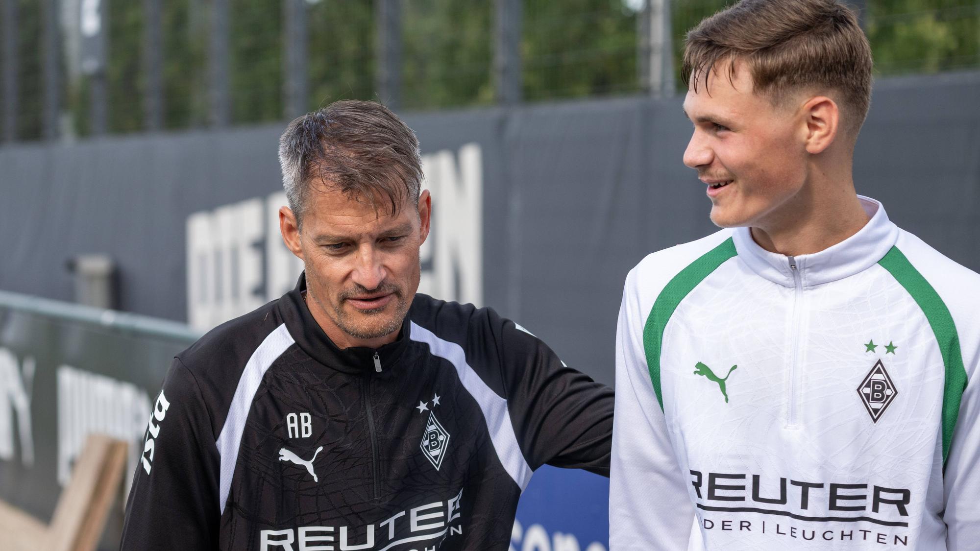 Alexander Blessin und Samin Mujevic in Sportkleidung